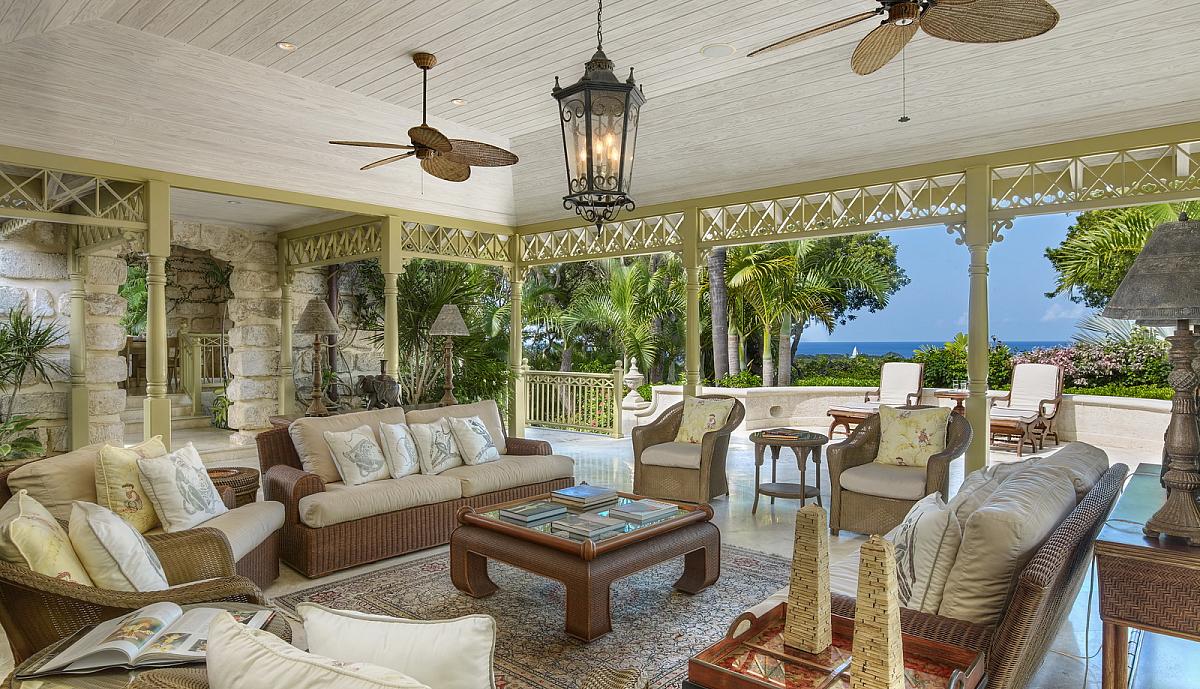 Sitting room with views over pool to the sea best Sandy Lane villas in Barbados